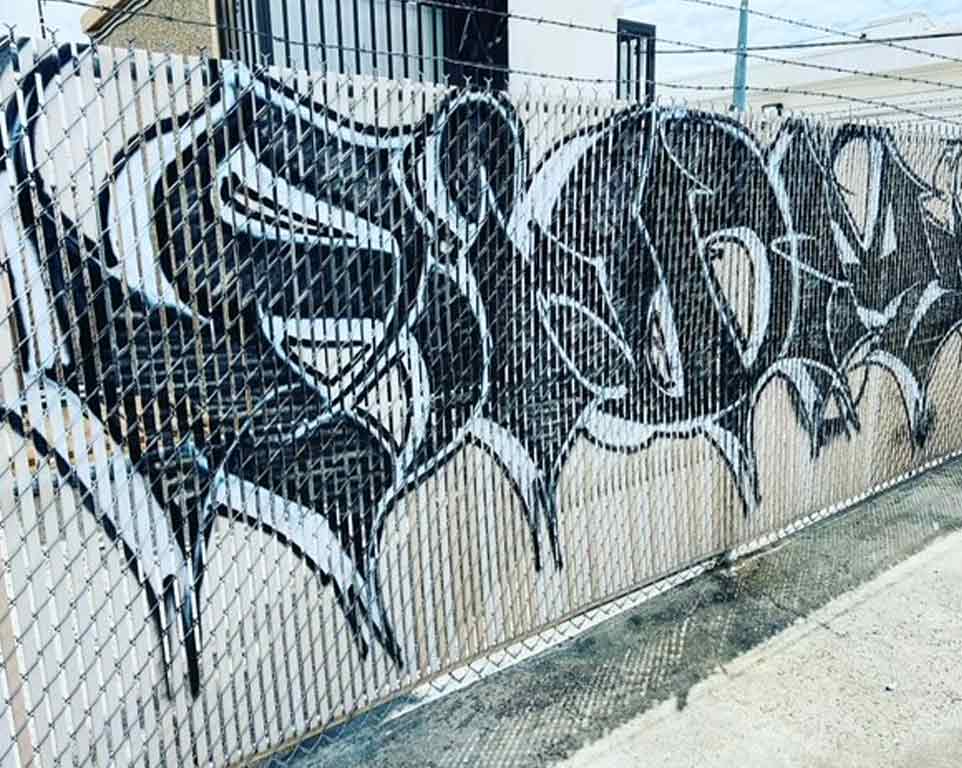 Graffiti removal on bricks before