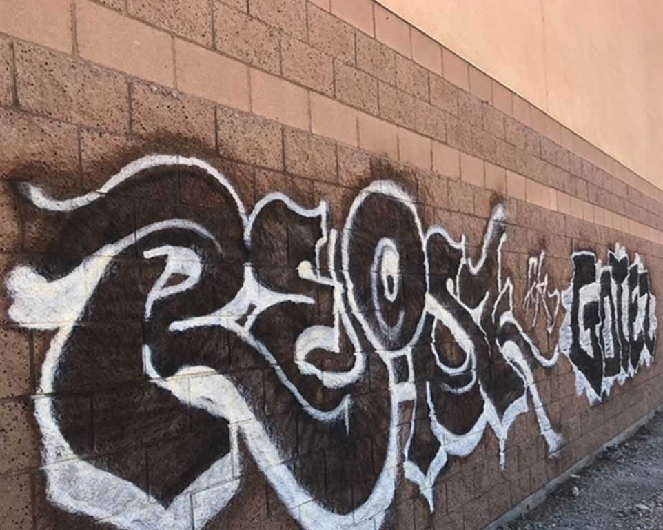 Graffiti removal on bricks before